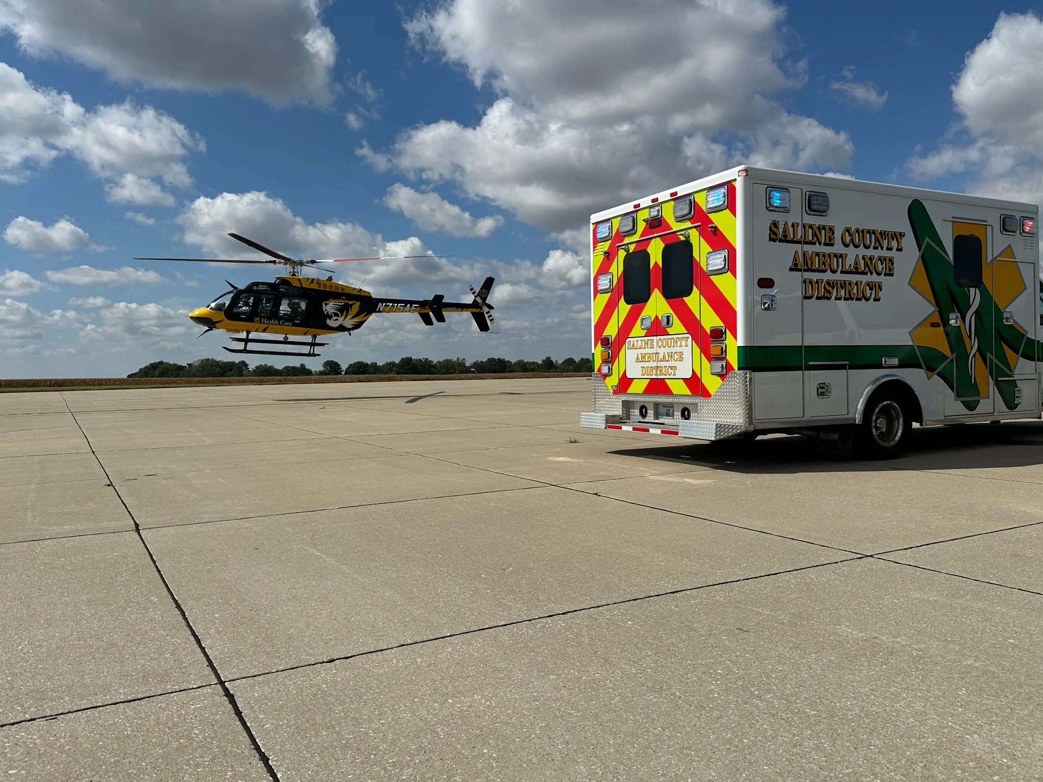 Ambulance and helicopter on runway